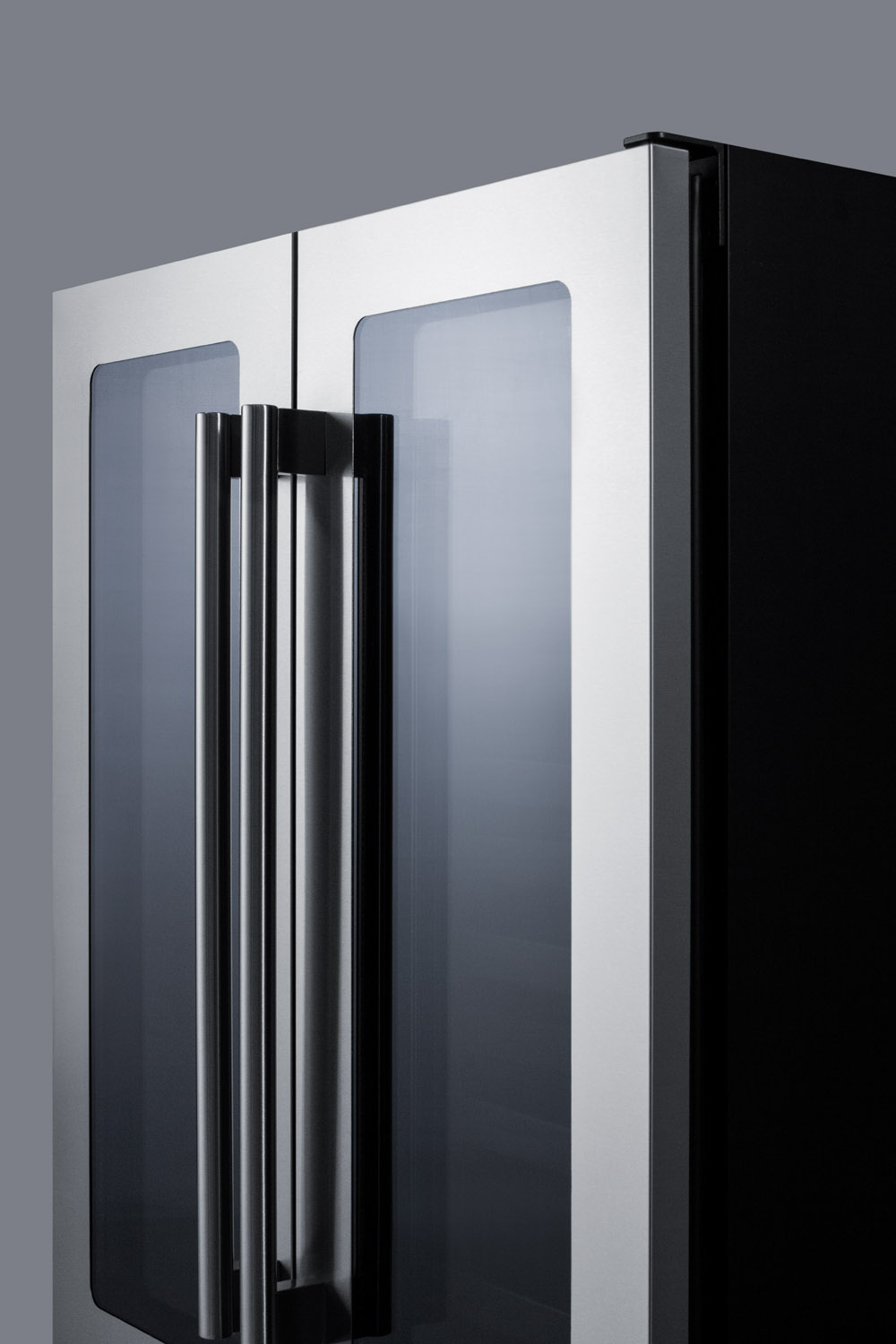 ADA compliant built-in or freestanding dual zone wine/beverage center with French door swing and seamless stainless steel trimmed glass doors